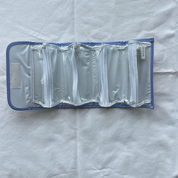 Striped Toiletry Bag with Multiple Zippered Sections - Picture 2 of 3